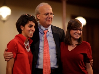 Karl Rove posing with students